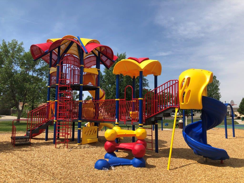 Onorato Playground in Firestone red, blue and yellow slides and elements