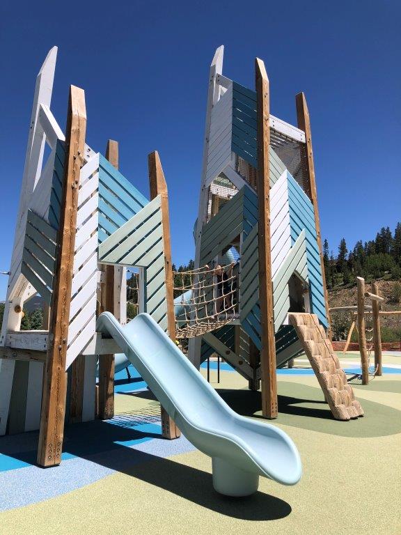 Two play structures at best playground in Breckenridge River Park