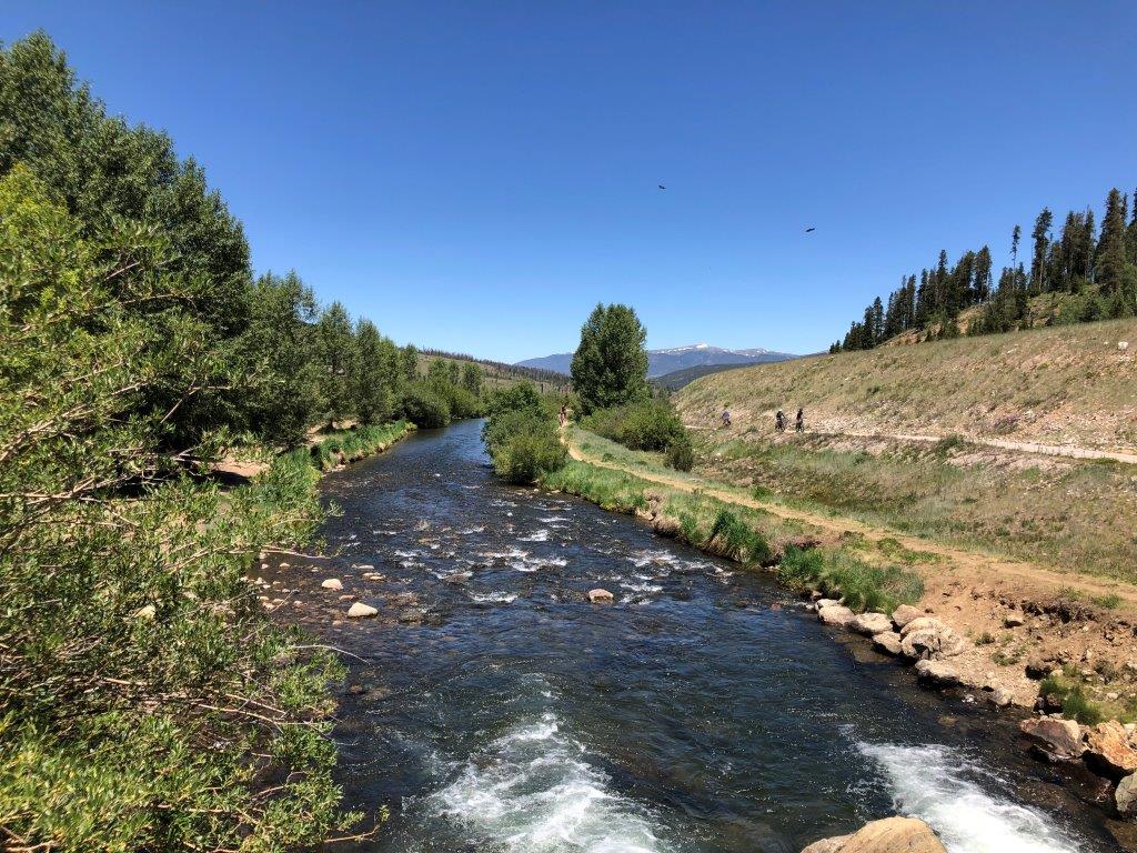 River and bike path in Breckenridge showing cyclists