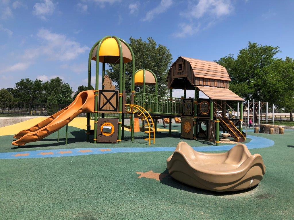 Avens Village at Island Grove Park in Greeley best themed playgrounds in Colorado inclusive playground