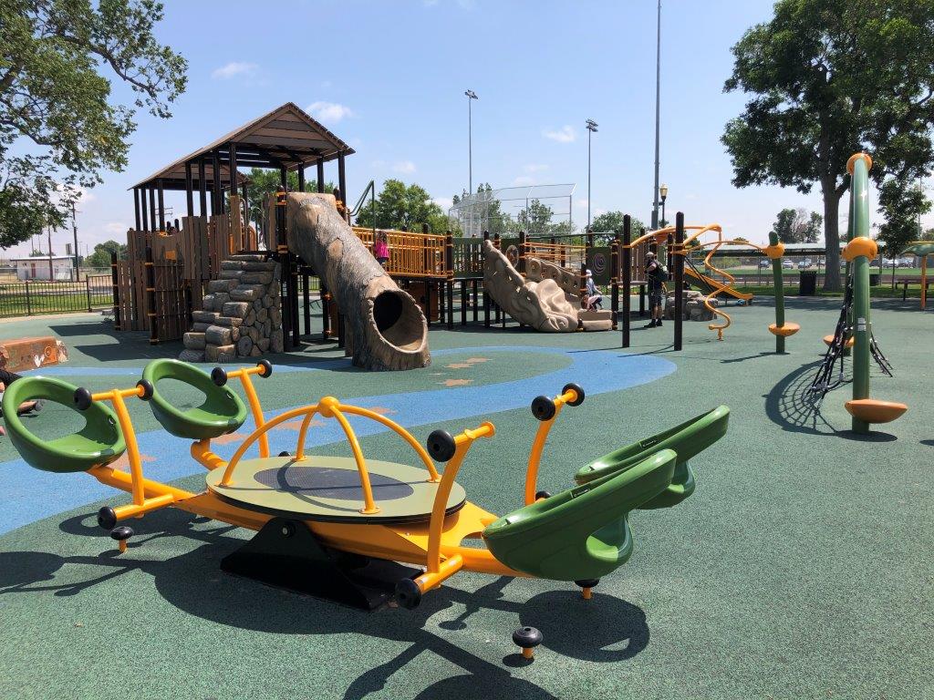 Horizontal view of play area with 4 person seesaw