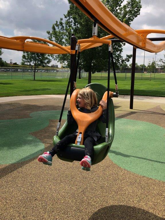 Inclusive playground zipline Avens Village Greeley