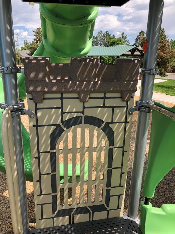 Castle themed elements at playground in Littleton CO