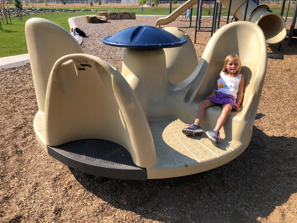 Inclusive accessible merry go round at Fort Collins park