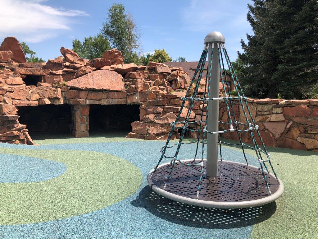 Cone shaped spinner at Boulder playground