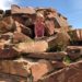 Arapahoe Ridge Park in Boulder Colorado girl climbing through rock caves