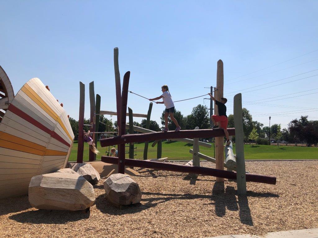 Log climbing options at Sugar Beet Park playground in Fort Collins