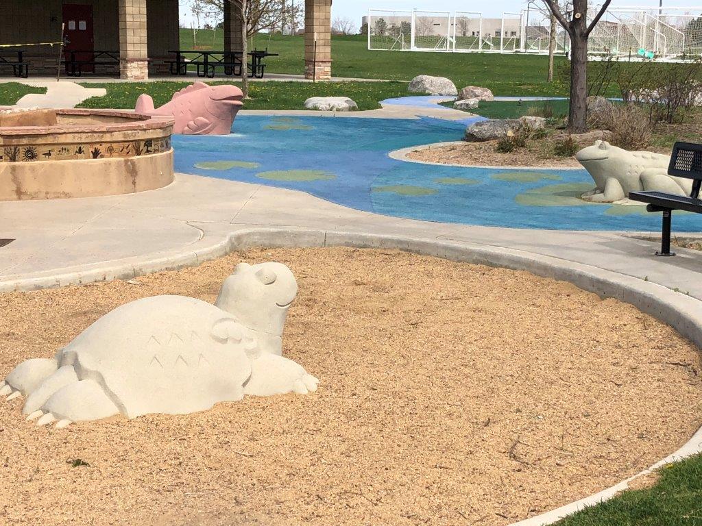 Sandbox and play features at Sandstone Ranch playground