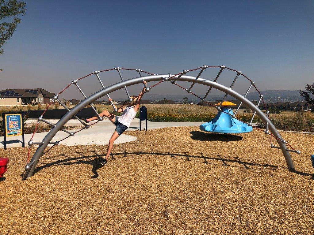 Curved monkey bars at Deputy Parrish Park in Castle Rock