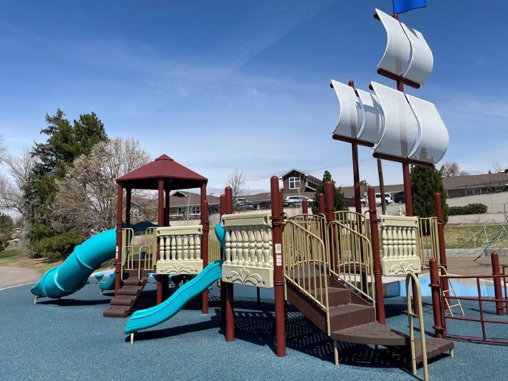 Side view of playground ship at LIttles Creek Park in Littleton