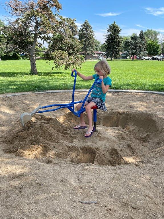 Girl playing in Sandbox