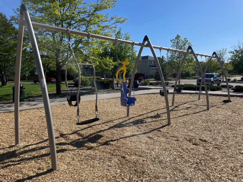 swings at Settlers Park in Firestone Colorado