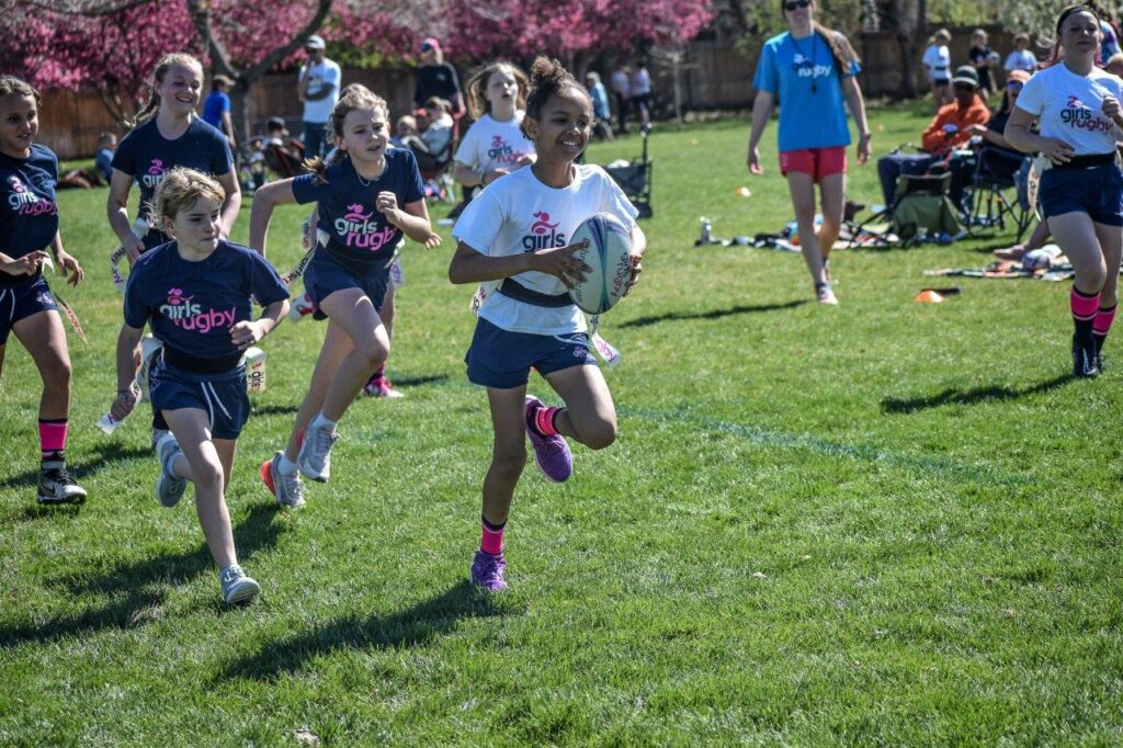 Girl playing flag rugby