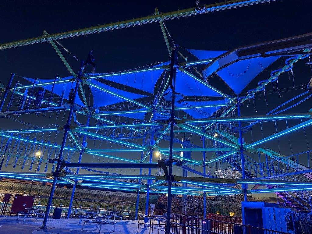 Boondocks Colorado ropes course lit up at night