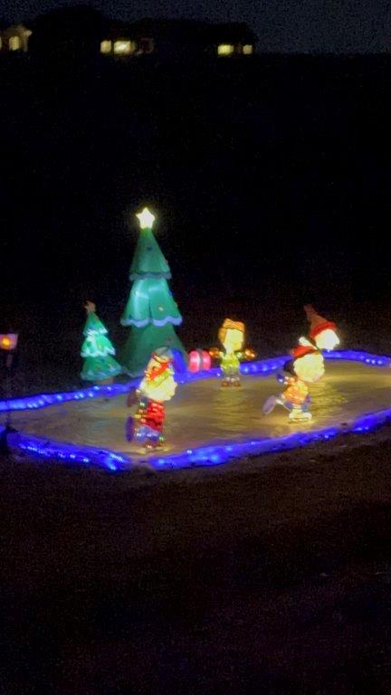 Charlie Brown ice skating holiday light scene