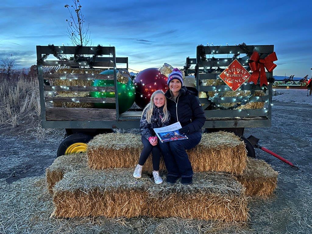 photo opp for Christmas with hay bales and giant ornaments