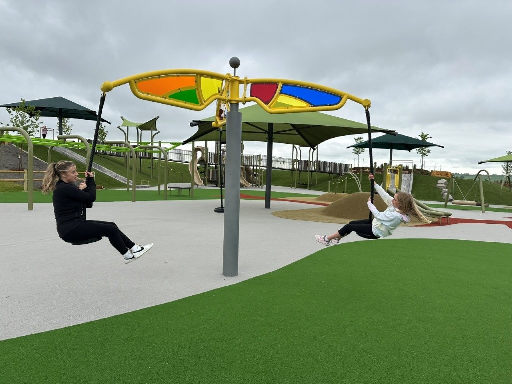 awesome swing merry go round at Loveland Willow Bend Park