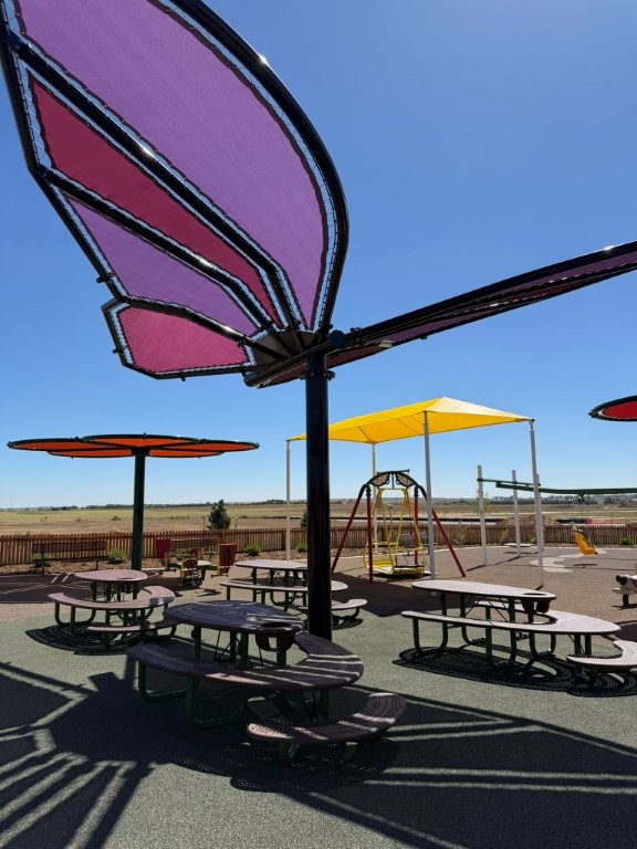 butterfly shade structure at S'Miles Playground at Berthoud Adaptive Park Project