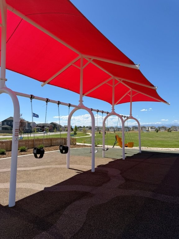 Swings with giant shade cover
